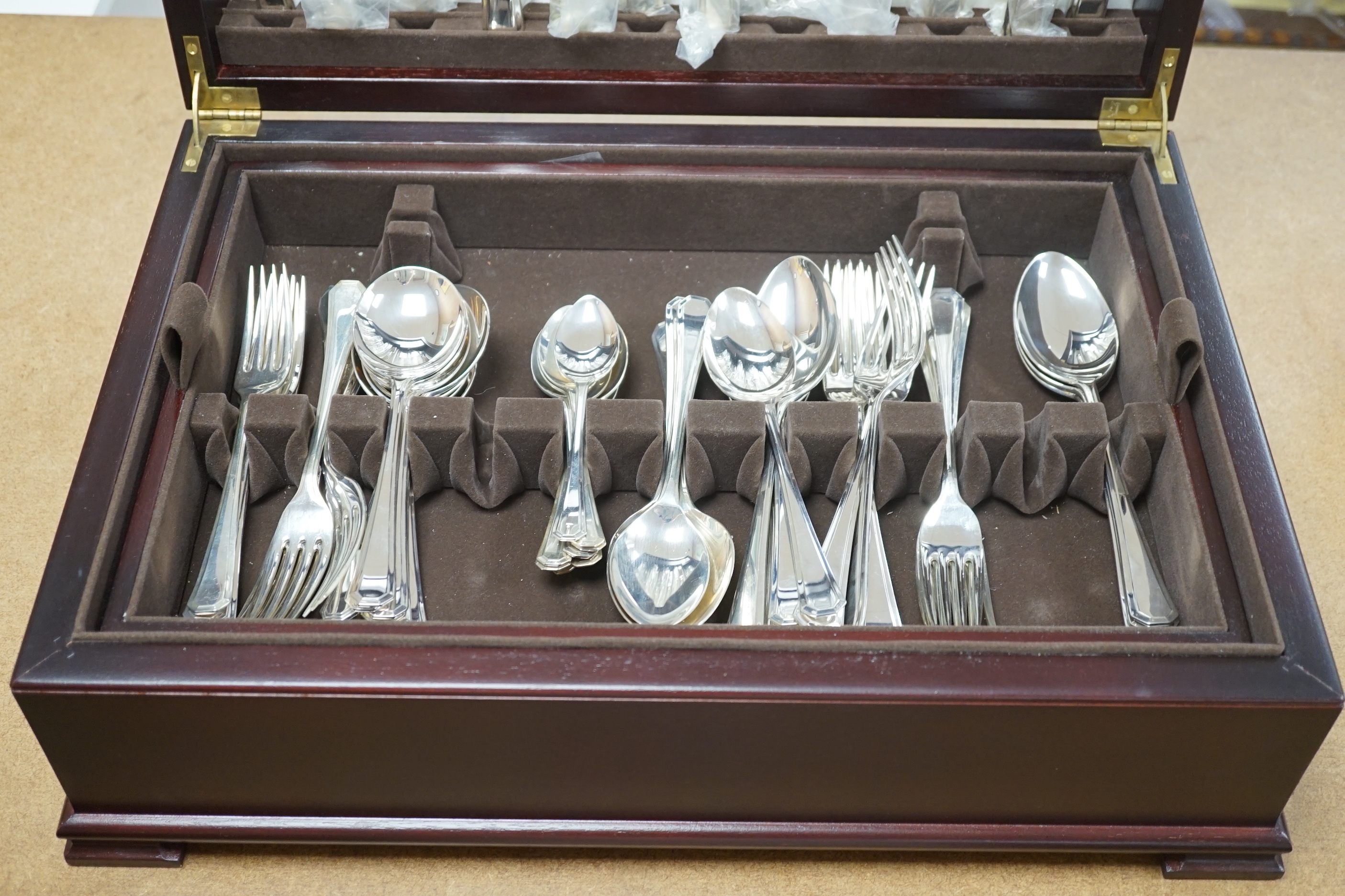 A modern Arthur Price canteen of silver Grecian pattern cutlery for eight, comprising sixty items, eight each of the following, table forks, dessert forks, soup spoons, teaspoons, dessert spoons, silver handled table and